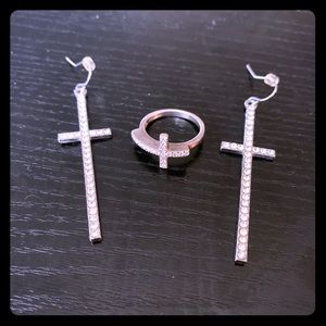 Silver cross earrings, matching silver cross ring.